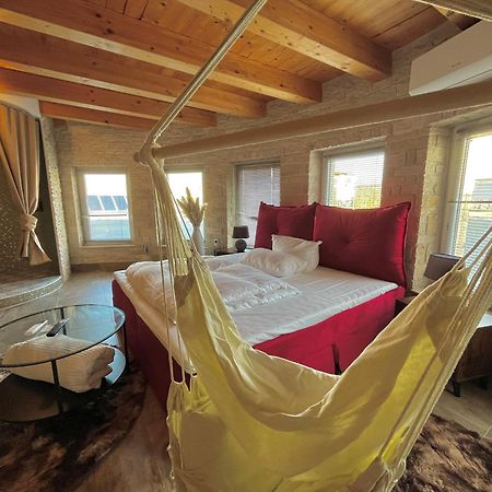 Hotel Zur Alten Stadtkellerei ไลป์ซิก ภายนอก รูปภาพ A room at the hotel