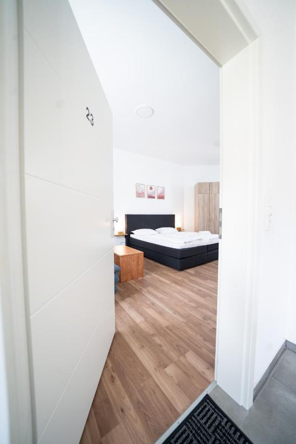 Hotel Zur Alten Stadtkellerei ไลป์ซิก ภายนอก รูปภาพ A bedroom in a serviced apartment