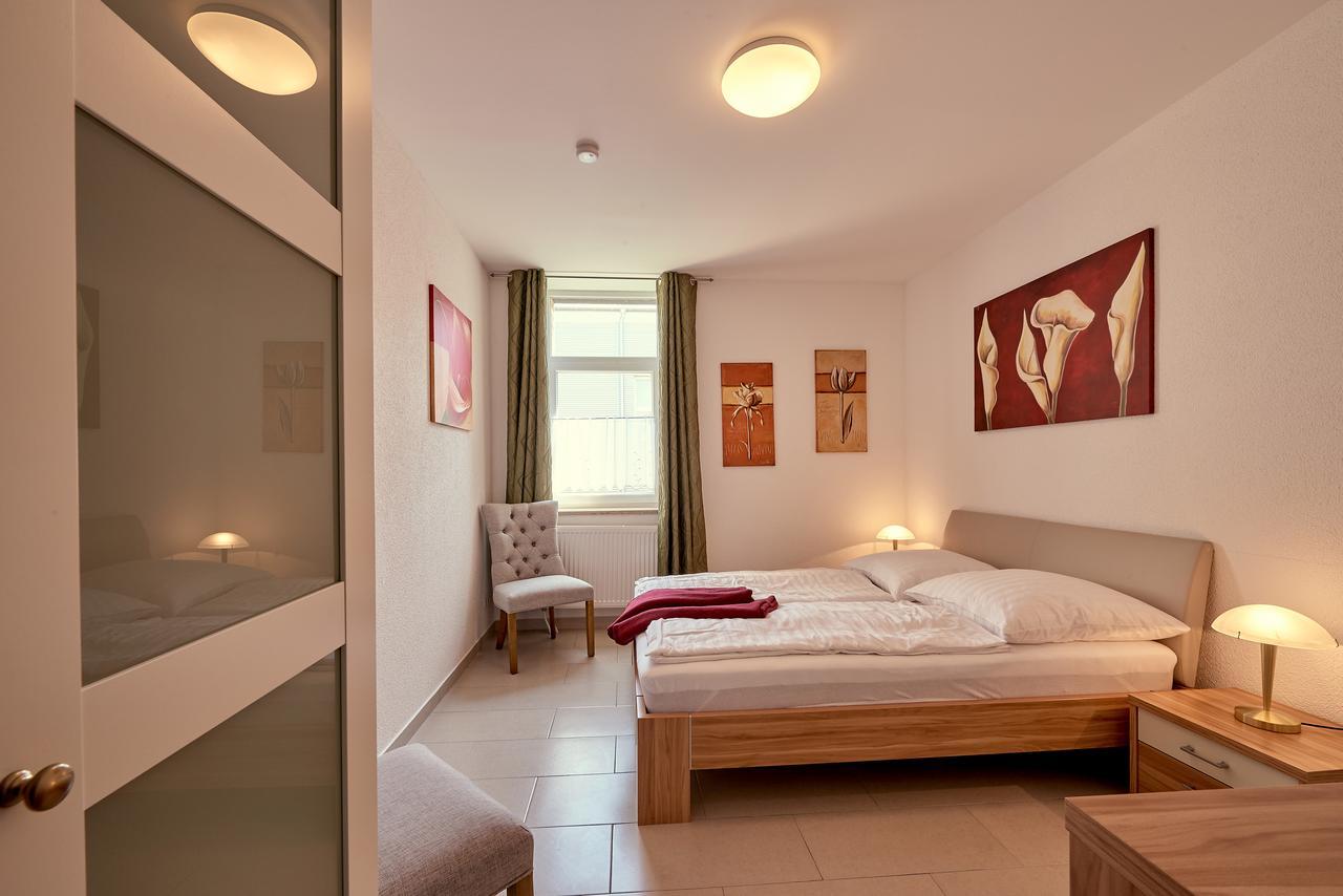Hotel Zur Alten Stadtkellerei ไลป์ซิก ภายนอก รูปภาพ A bedroom